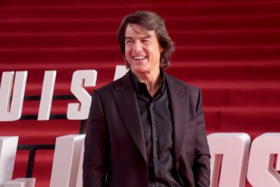 Tom Cruise at event smiling