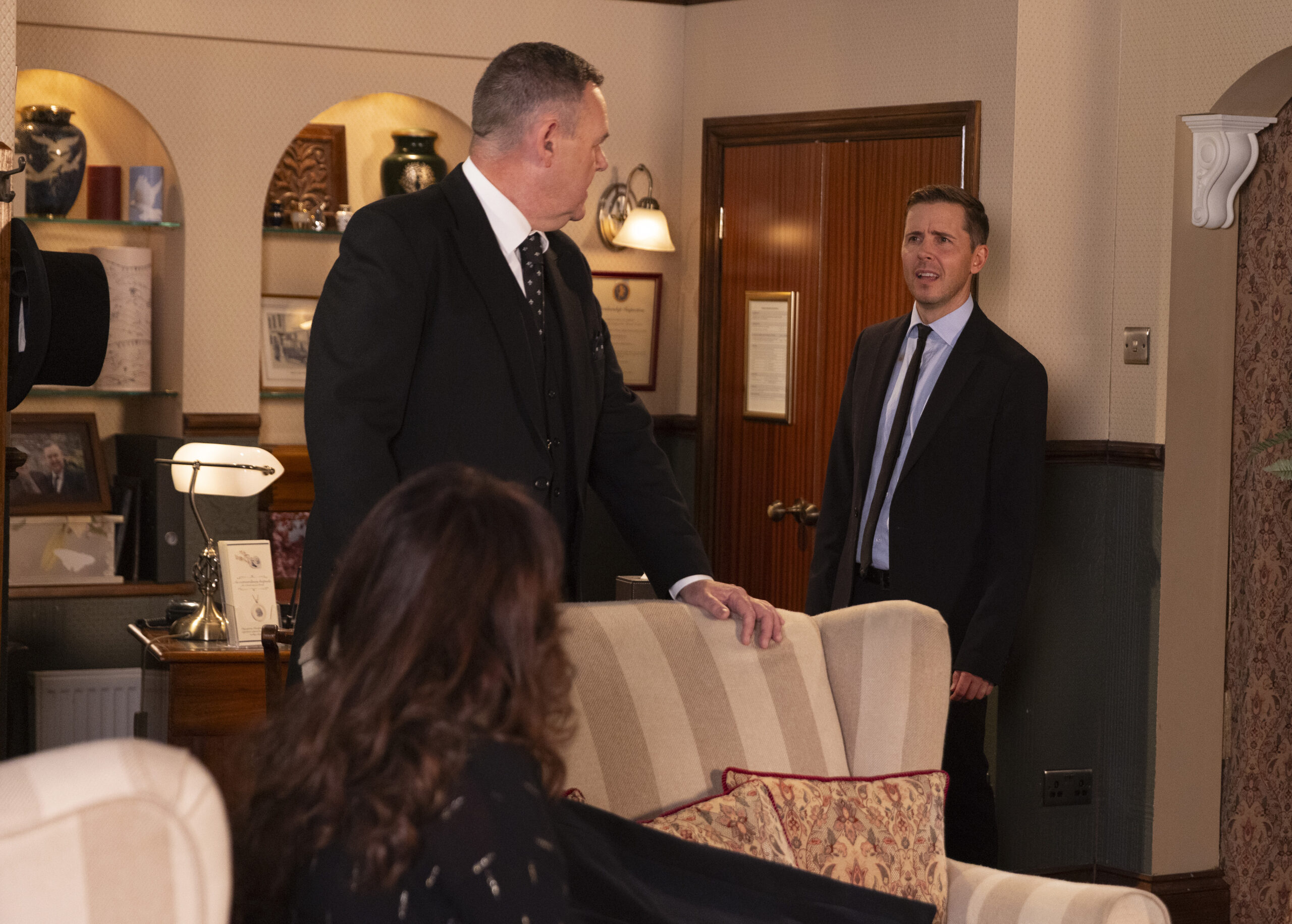 George and Todd talking in Coronation Street at work