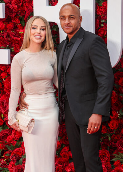 Katie Price and her husband posing