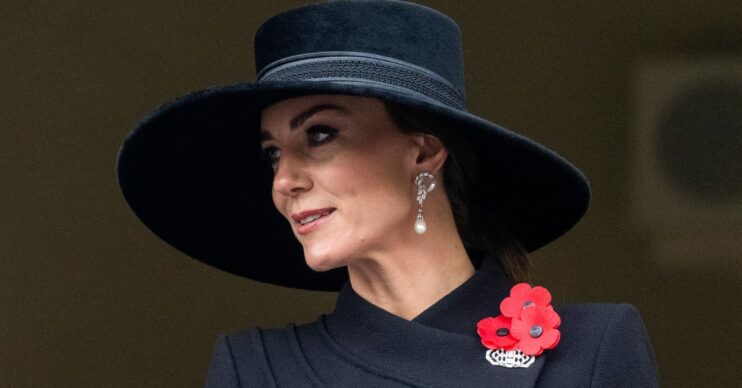 Kate Middleton wearing a black hat and a poppy on Remembrance Day