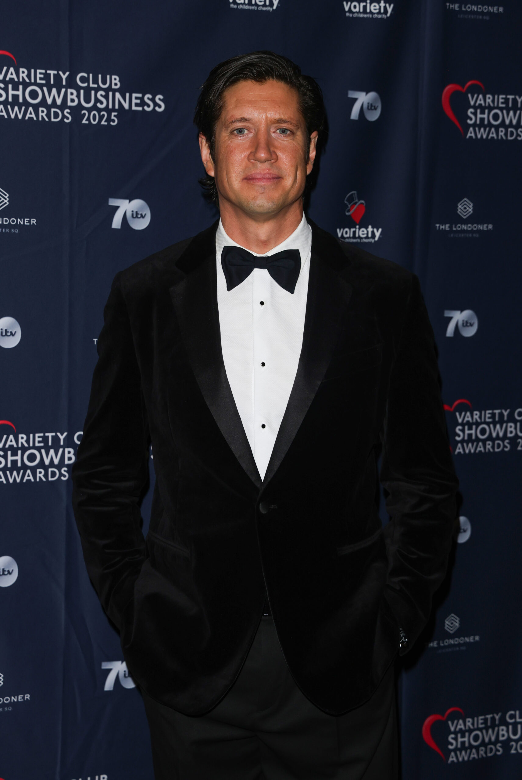 Vernon Kay in a suit and bow tie