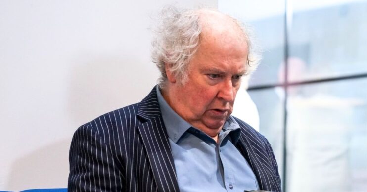 Nigel looks unhappy in EastEnders (Credit: BBC/Composite: ED!)