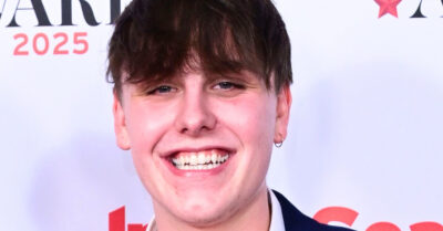 Coronation Street's Liam Scholes smiling