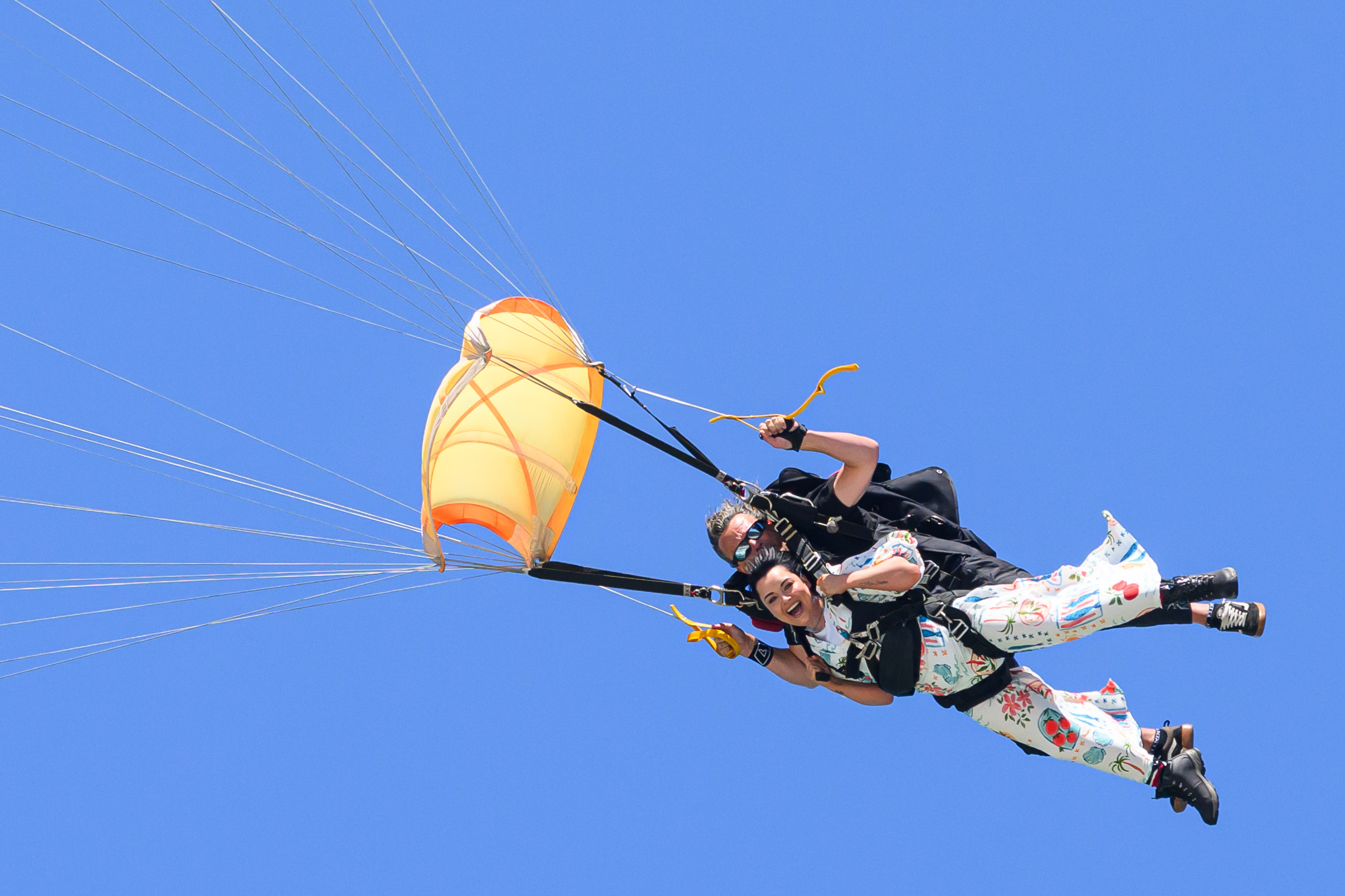 Shona McGarty parachuting into camp