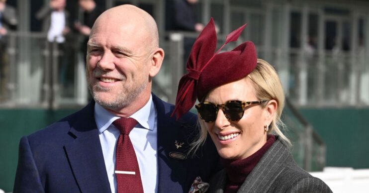 Mike and Zara Tindall smiling at Cheltenham