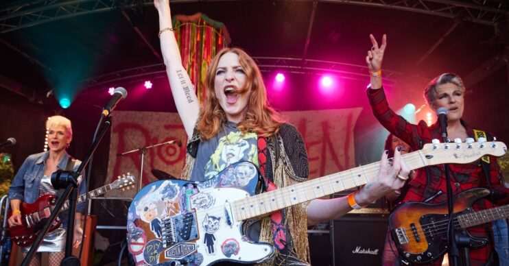 Rosalie Craig leads the Riot Women band performance