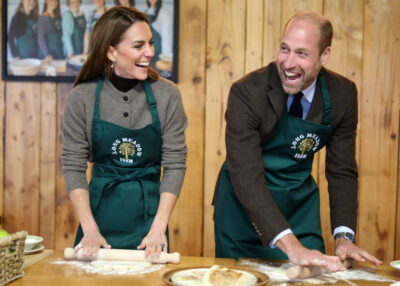 Prince William and Kate Middleton laughing and baking