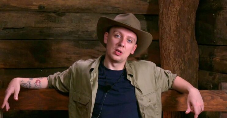 Aitch on I'm A Celebrity wearing a hat