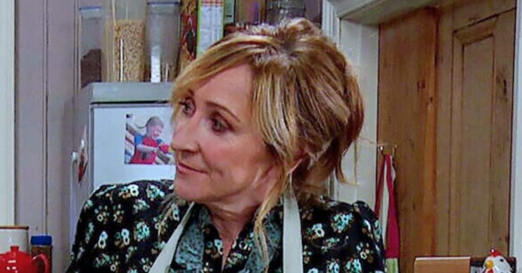 Laurel in Emmerdale looks smitten (Credit: ITV)