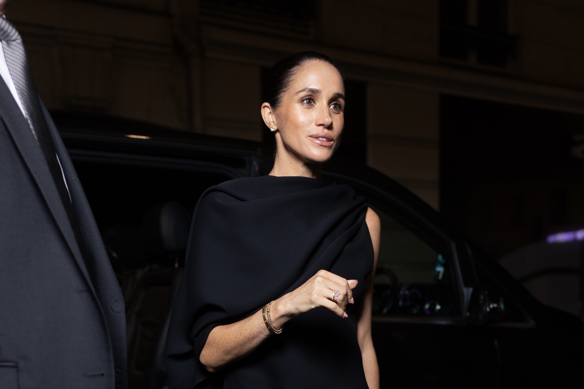 Meghan Markle at an event wearing black