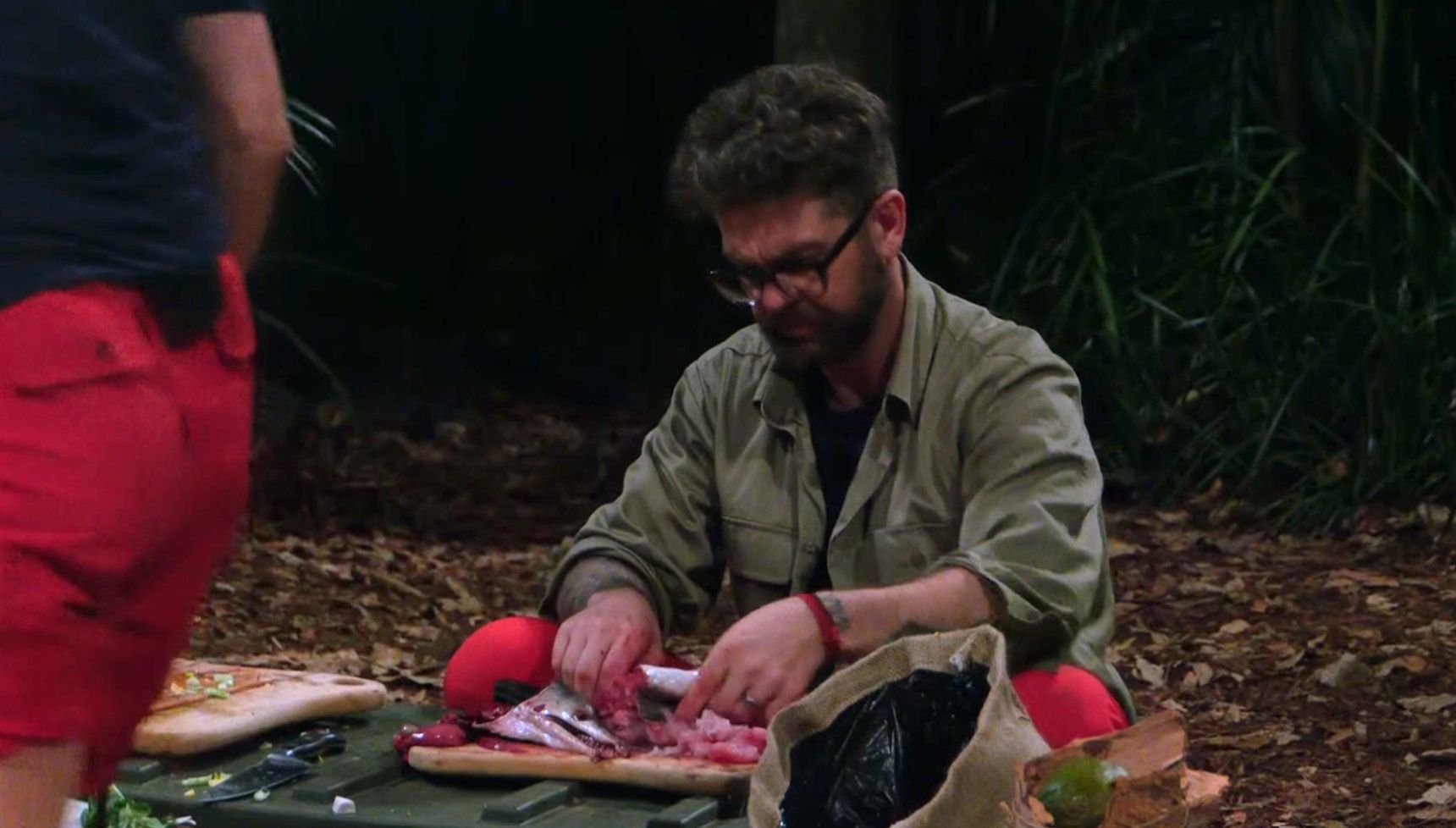 Jack Osbourne preparing a fish dinner
