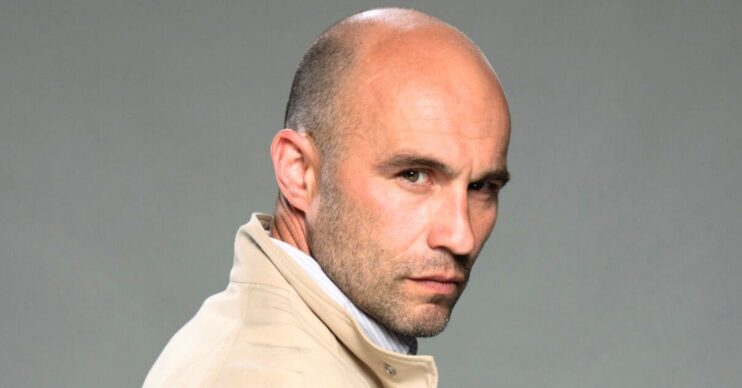 Teddy looking moody on EastEnders (Credit: BBC/Composite: ED!)