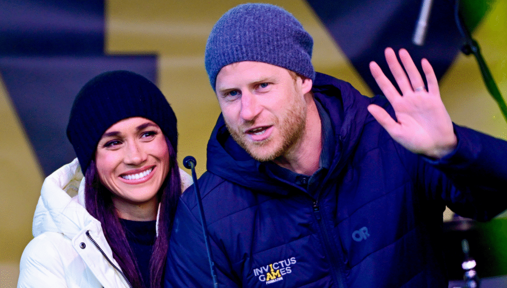 Harry and Meghan wearing winter hats at the Invictus Games
