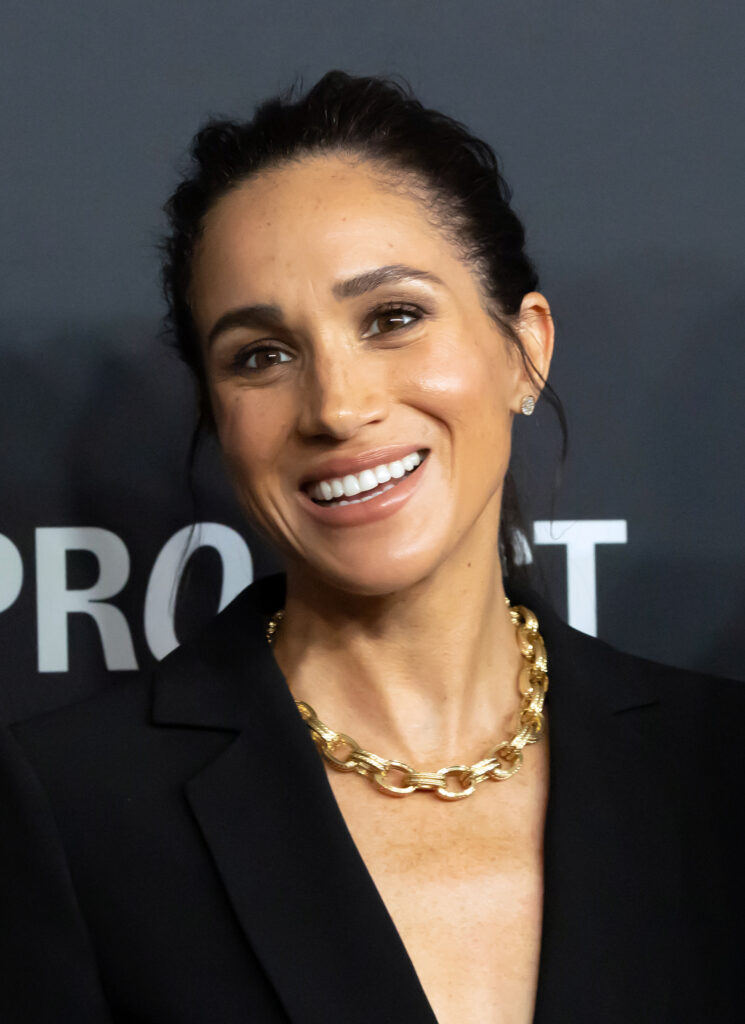 Meghan Markle at Project Healthy Minds gala smiling on the red carpet