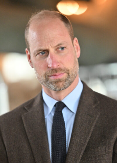 Prince William looks serious during royal engagement