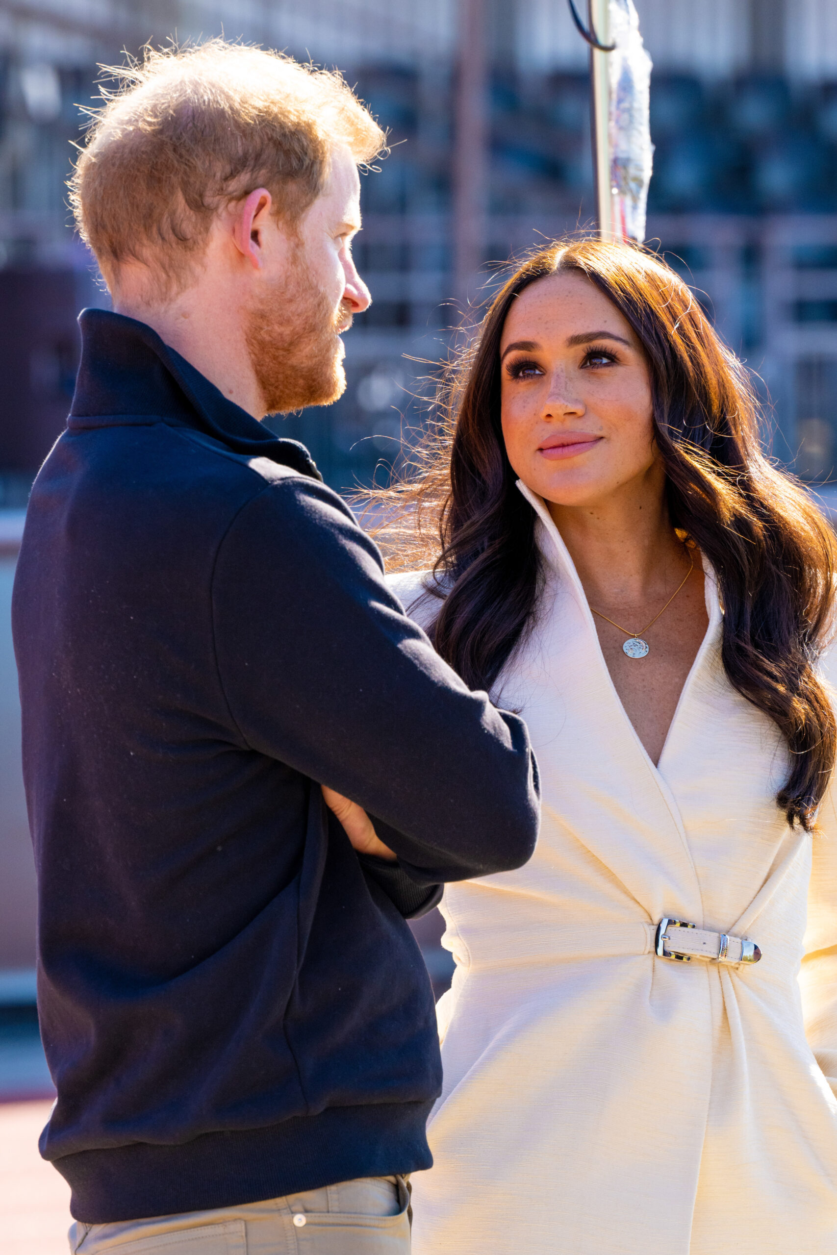 Meghan Markle looking lovingly at Prince Harry at Invictus Games