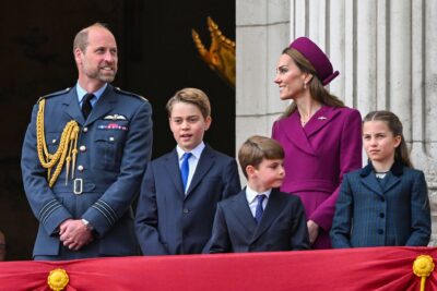 William and Kate with their kids on the balcony