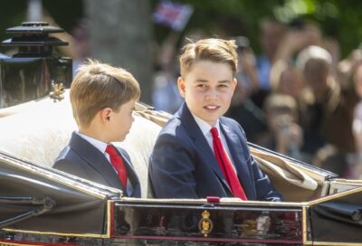 Prince George smiling on carriage