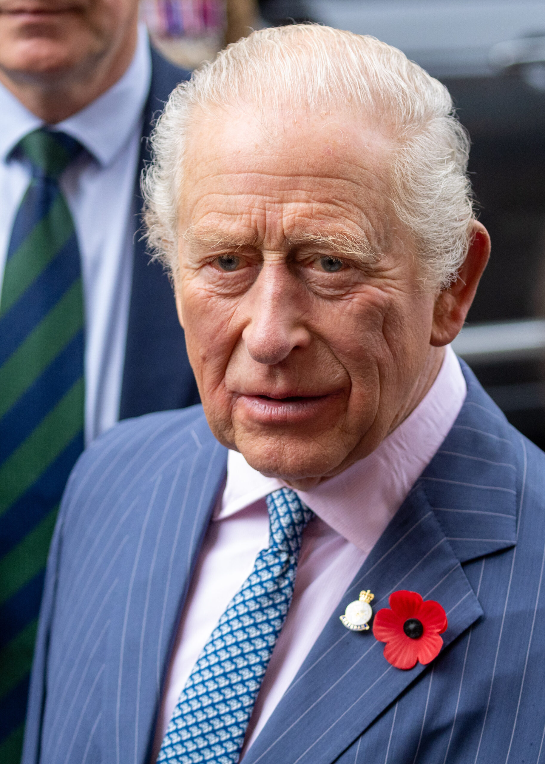 King Charles in navy suit