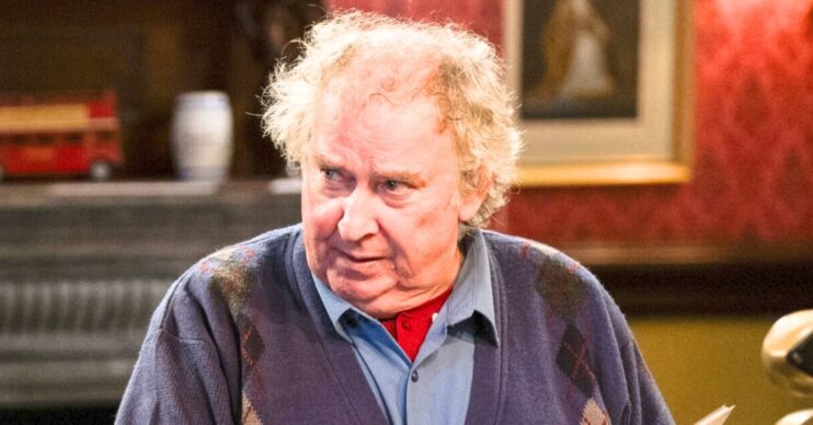 Nigel looks worried on EastEnders (Credit: BBC/Composite: EI)