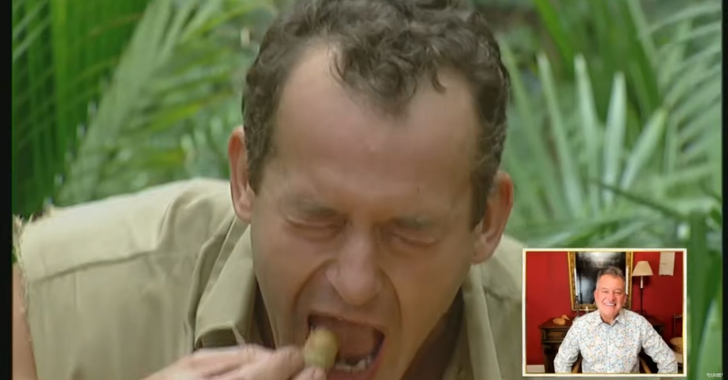 Paul Burrell doing an eating challenge I'm A Celebrity