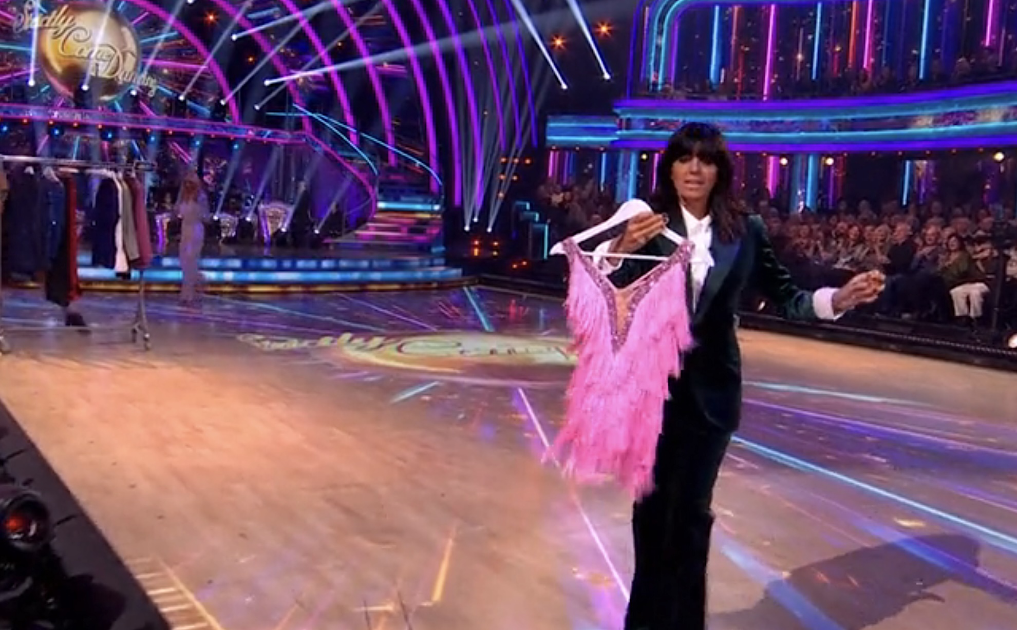 Claudia runs with a pink dress