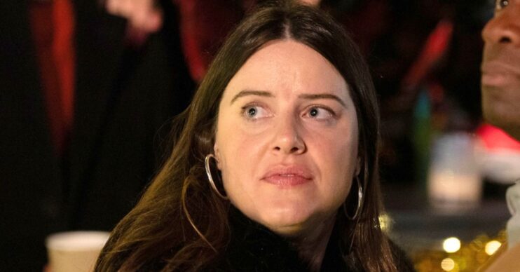 Zoe's stalker strikes again, leaving her looking worried on EastEnders (Credit: BBC/Composite: ED!)