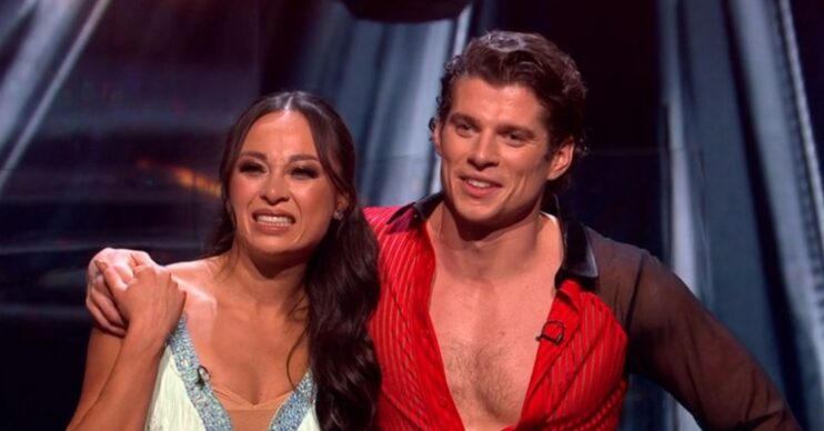 Katya Jones and Lewis Cope smiling on Strictly
