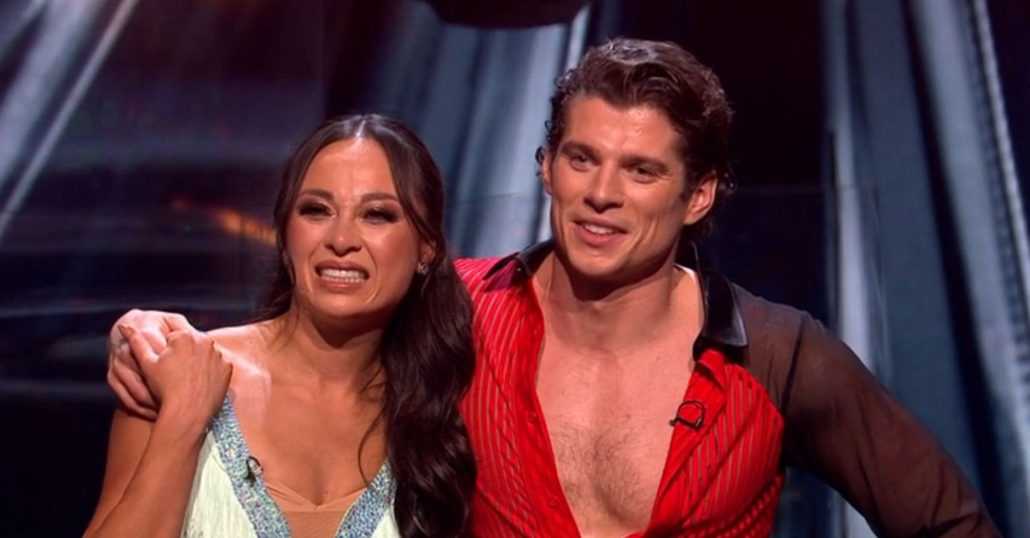 Katya Jones and Lewis Cope smiling on Strictly