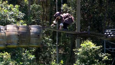 Shona McGarty crawls on the plank