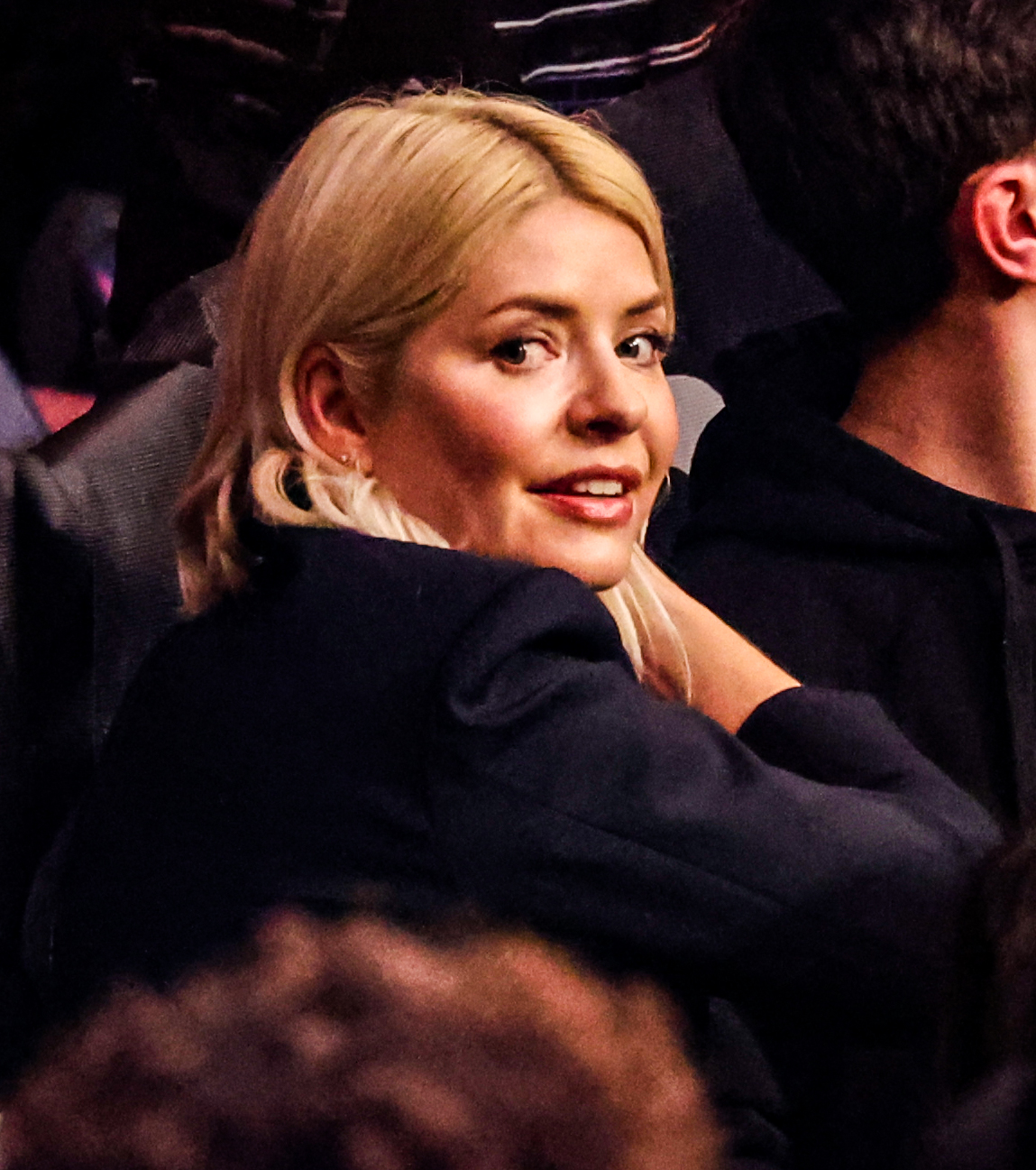 Holly Willoughby looking over her shoulder