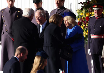 King Charles greeting President Frank-Walter Steinmeier beside Queen Camilla smiling and greeting Germany's First Lady Elke Büdenbender