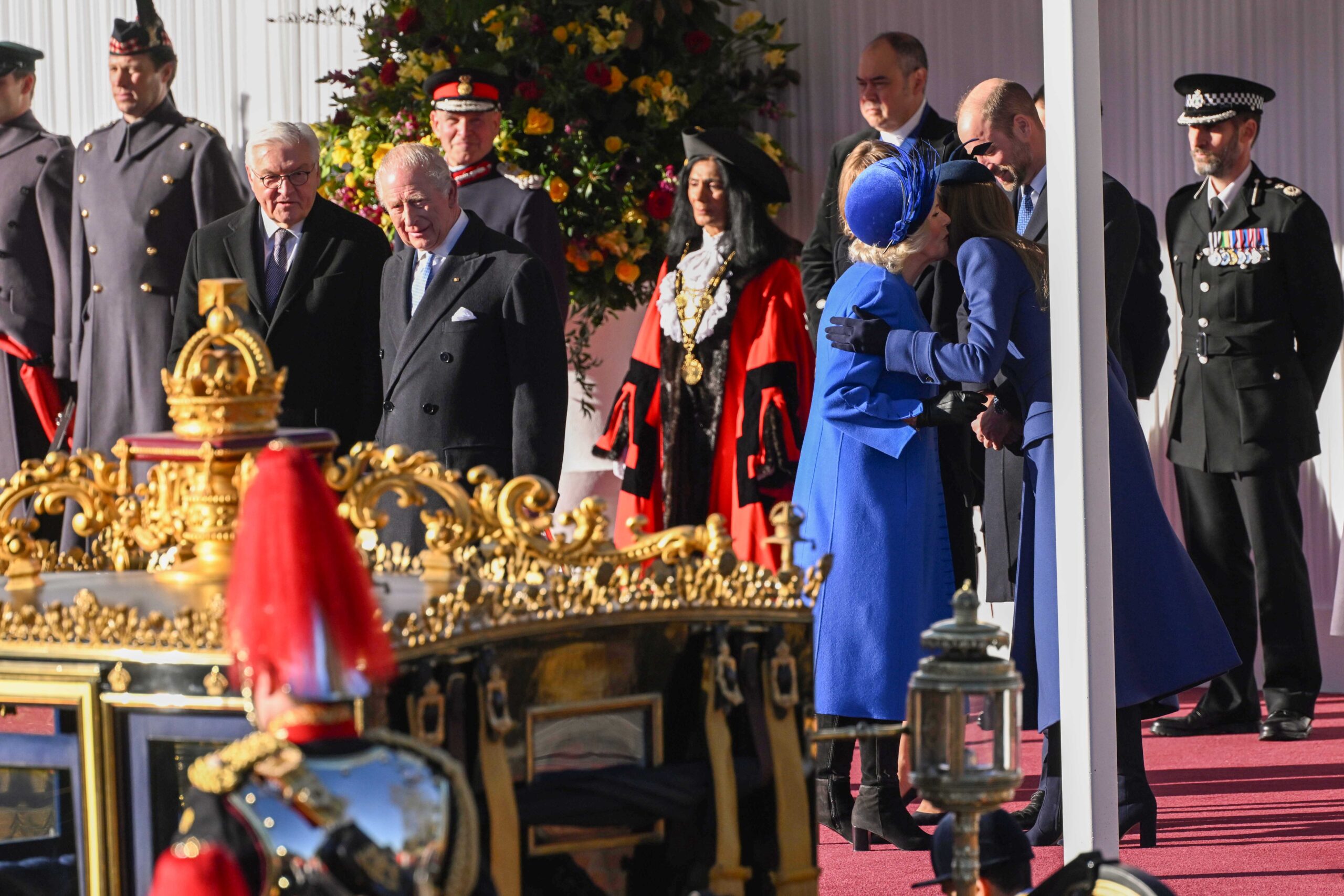 Kate Middleton curtsying to Queen Camilla 