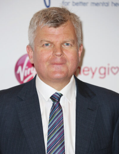 Adrian Chiles looking to camera