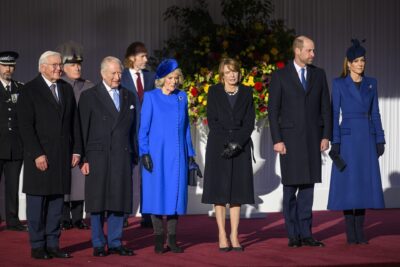 The royal family stand to welcome the President of Germany