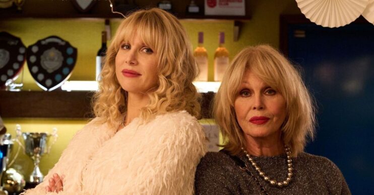 Amandaland's Amanda and Felicity in smart clothes facing the camera