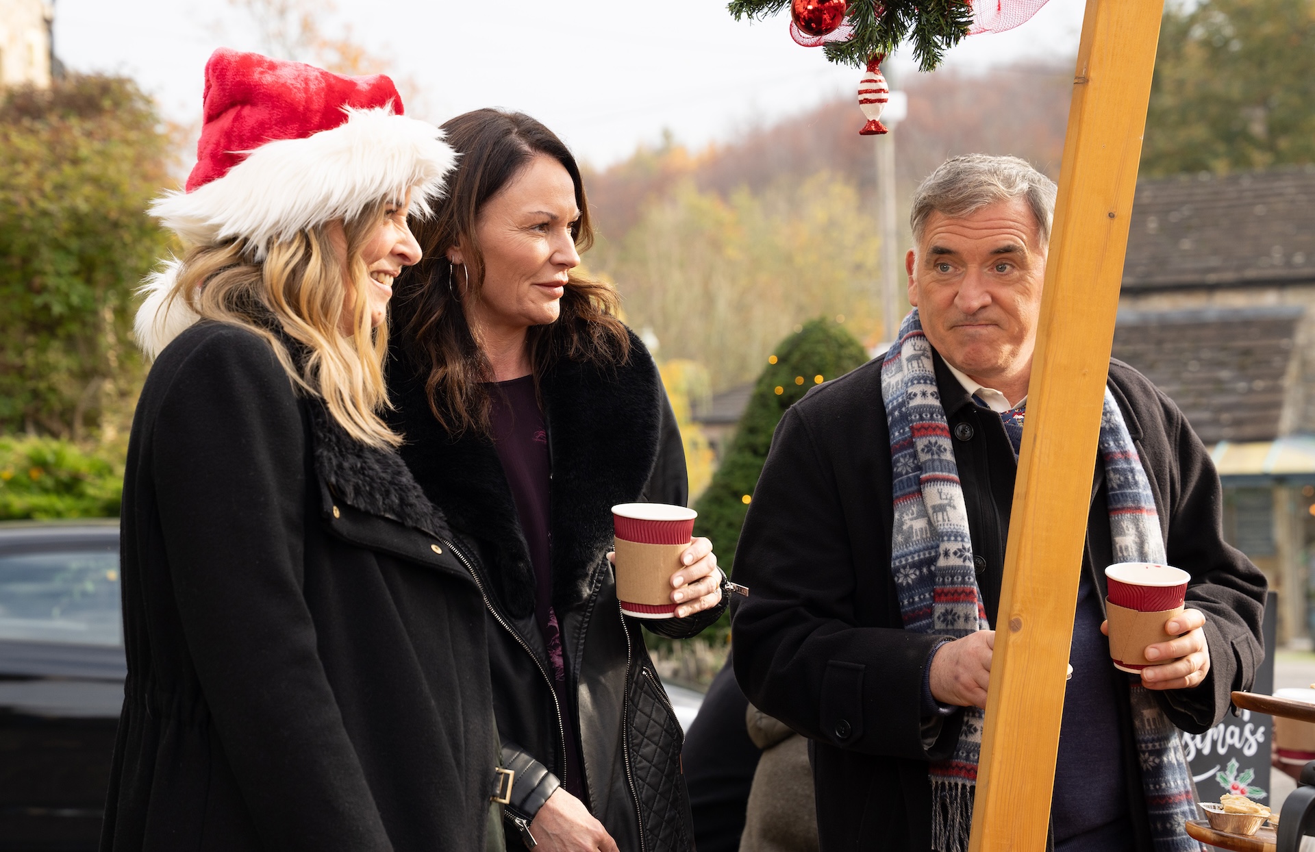 Charity, Chas and Bob get in the festive spirit (Credit: ITV)