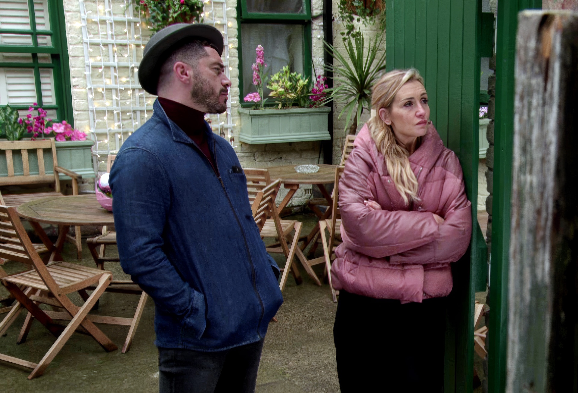 Adam talking to upset Eva outside in Coronation Street