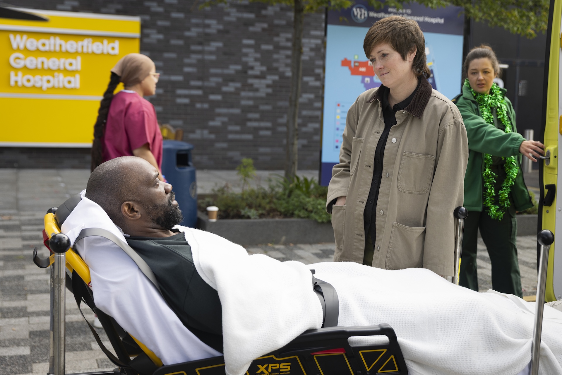 Becky and Costello outside the hospital in Coronation Street