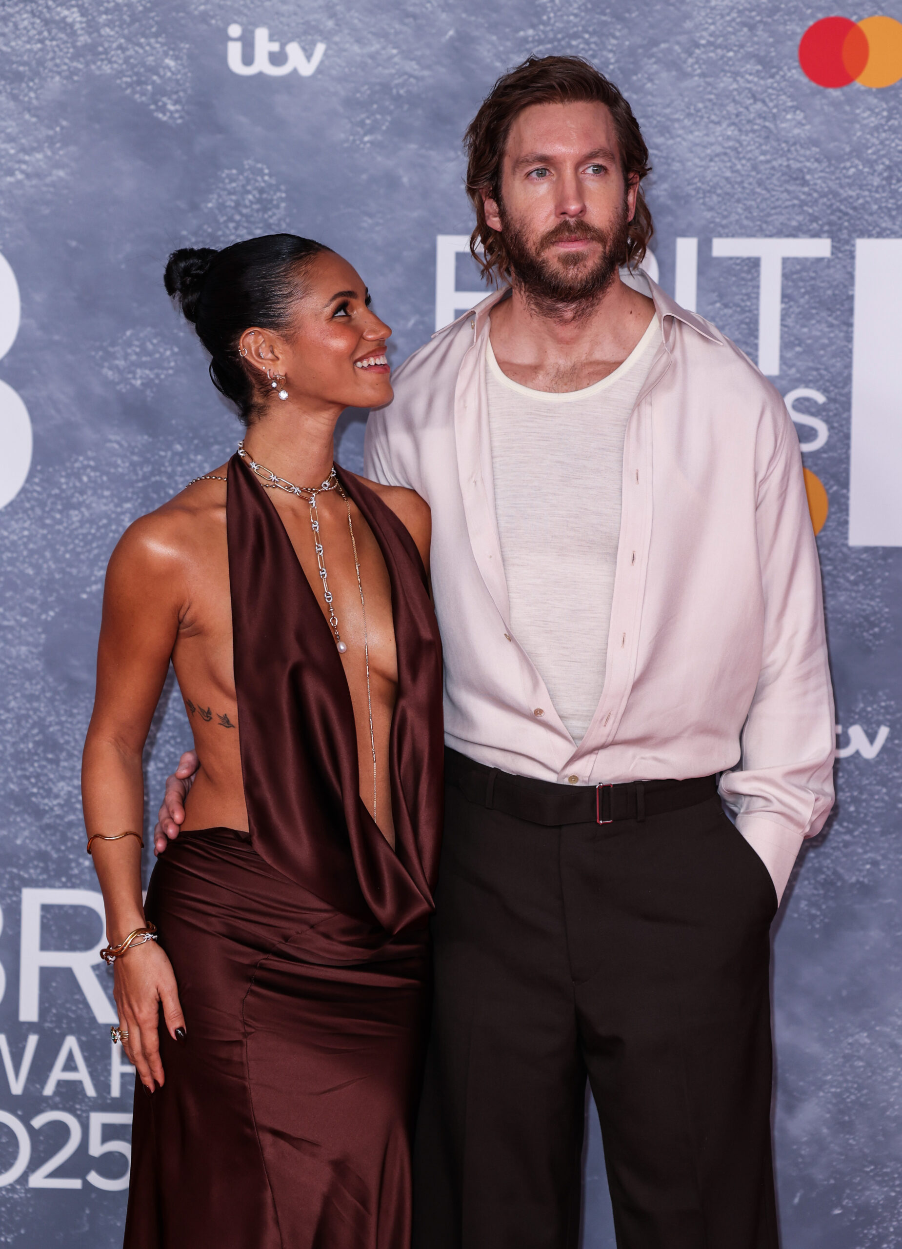 Vick Hope and Calvin Harris posing