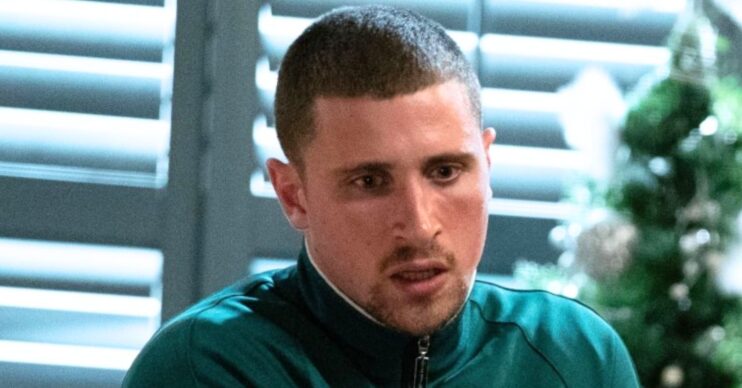 Harry looks haunted on EastEnders (Credit: BBC/Composite: ED!)