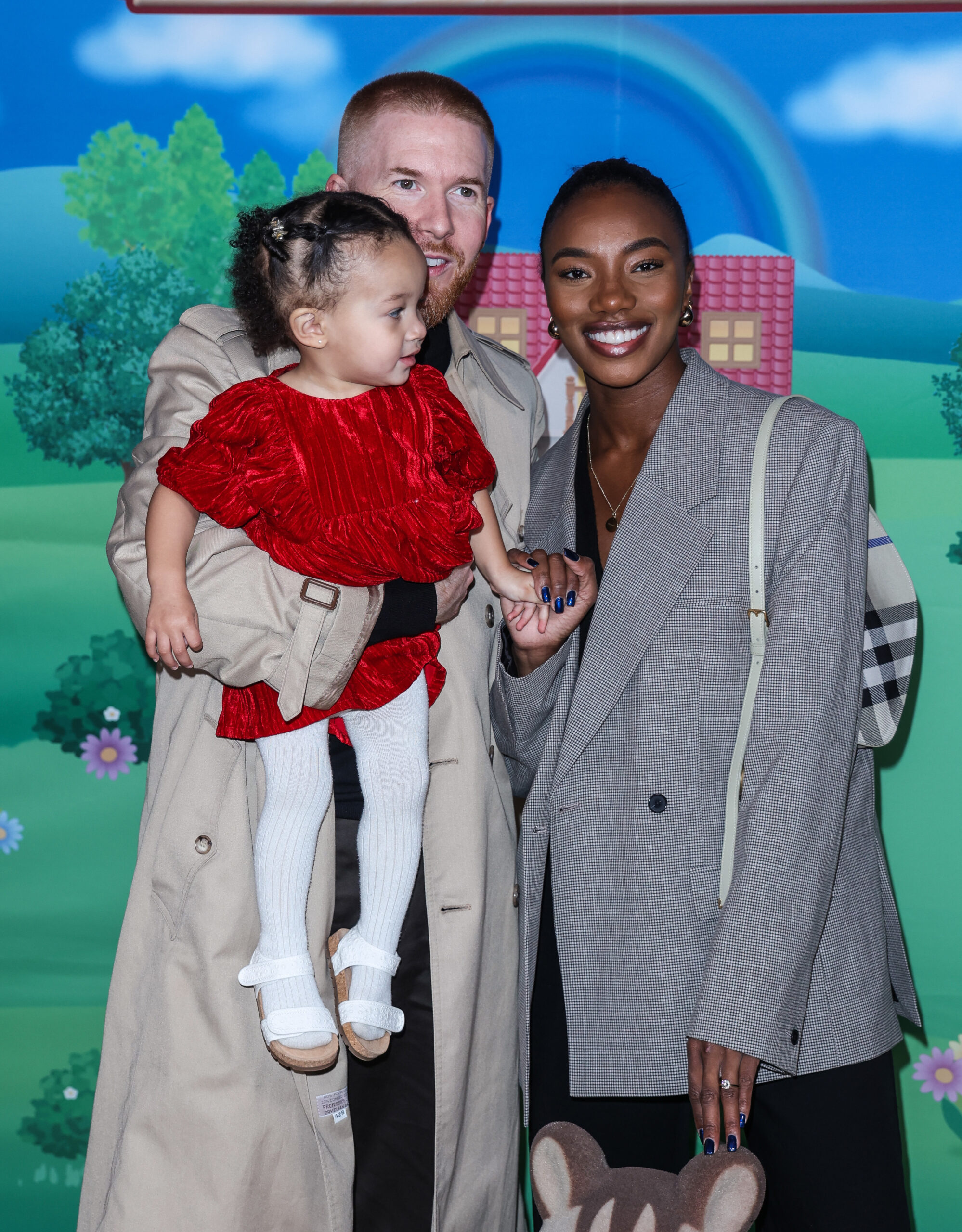 Neil Jones and Chyna Mills with their daughter