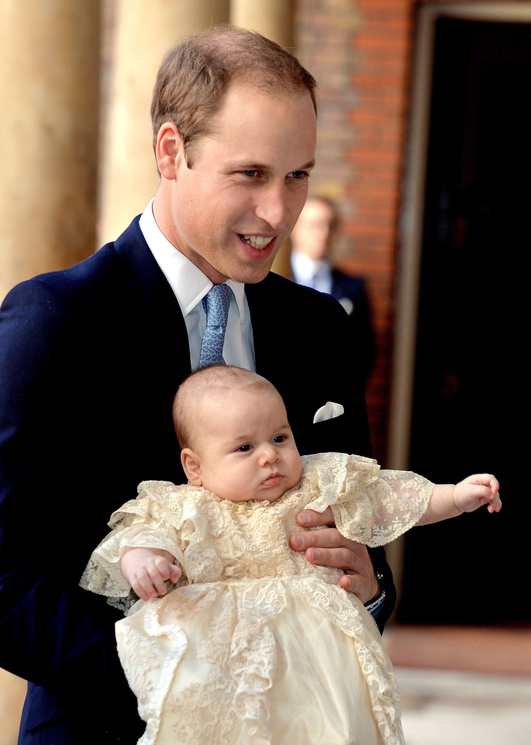 Prince William with baby George at his christening