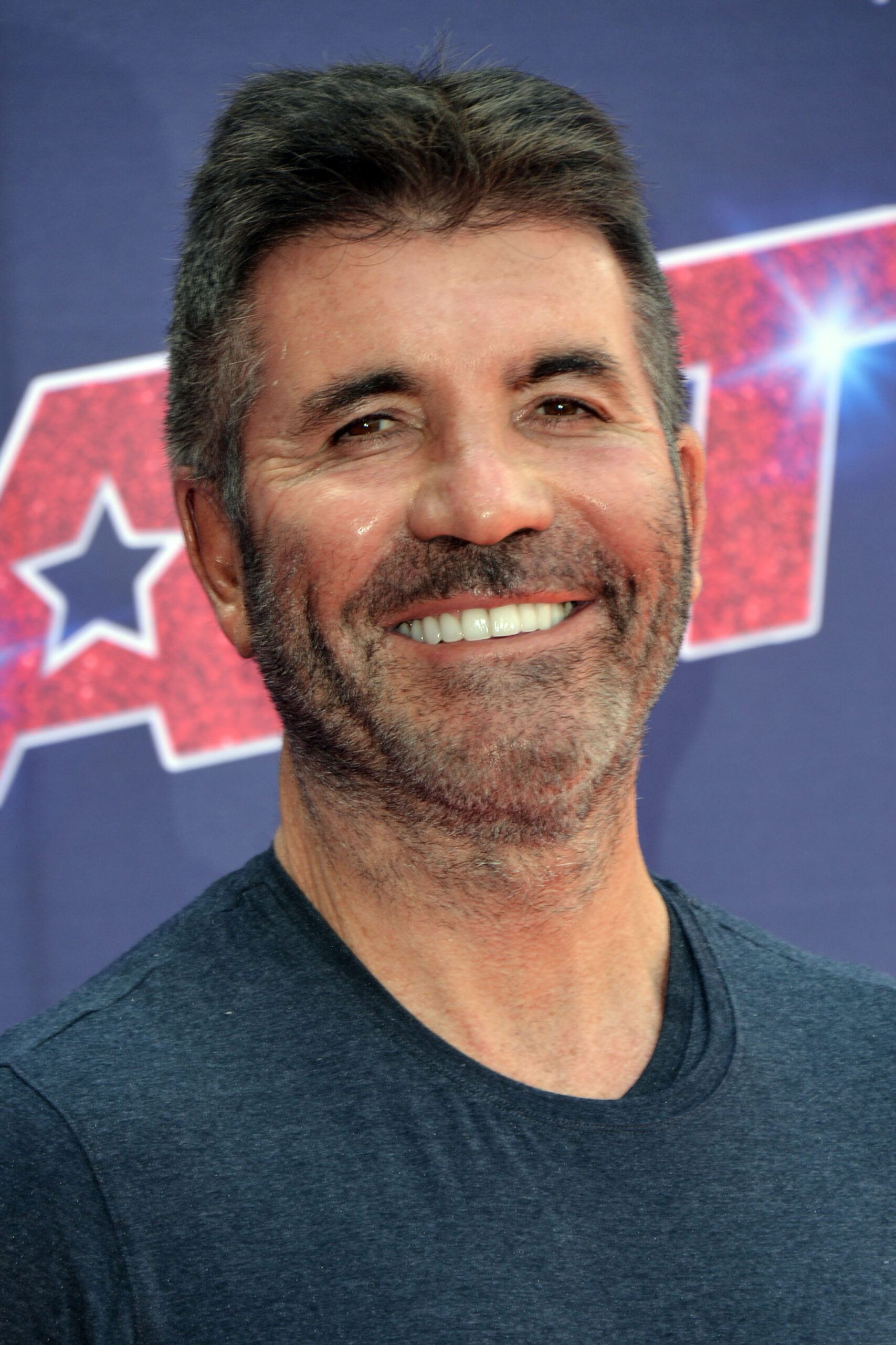 Simon Cowell smiling