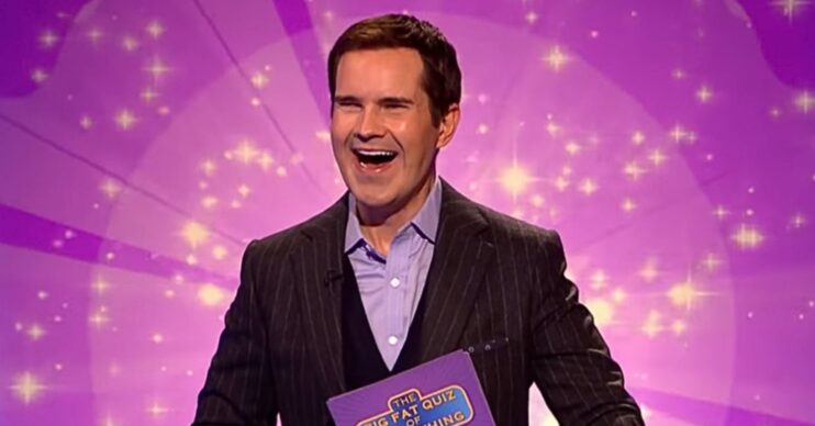 Jimmy Carr laughing while hosting The Big Fat Quiz