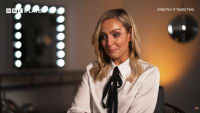 Strictly star Amy Dowden in a white shirt