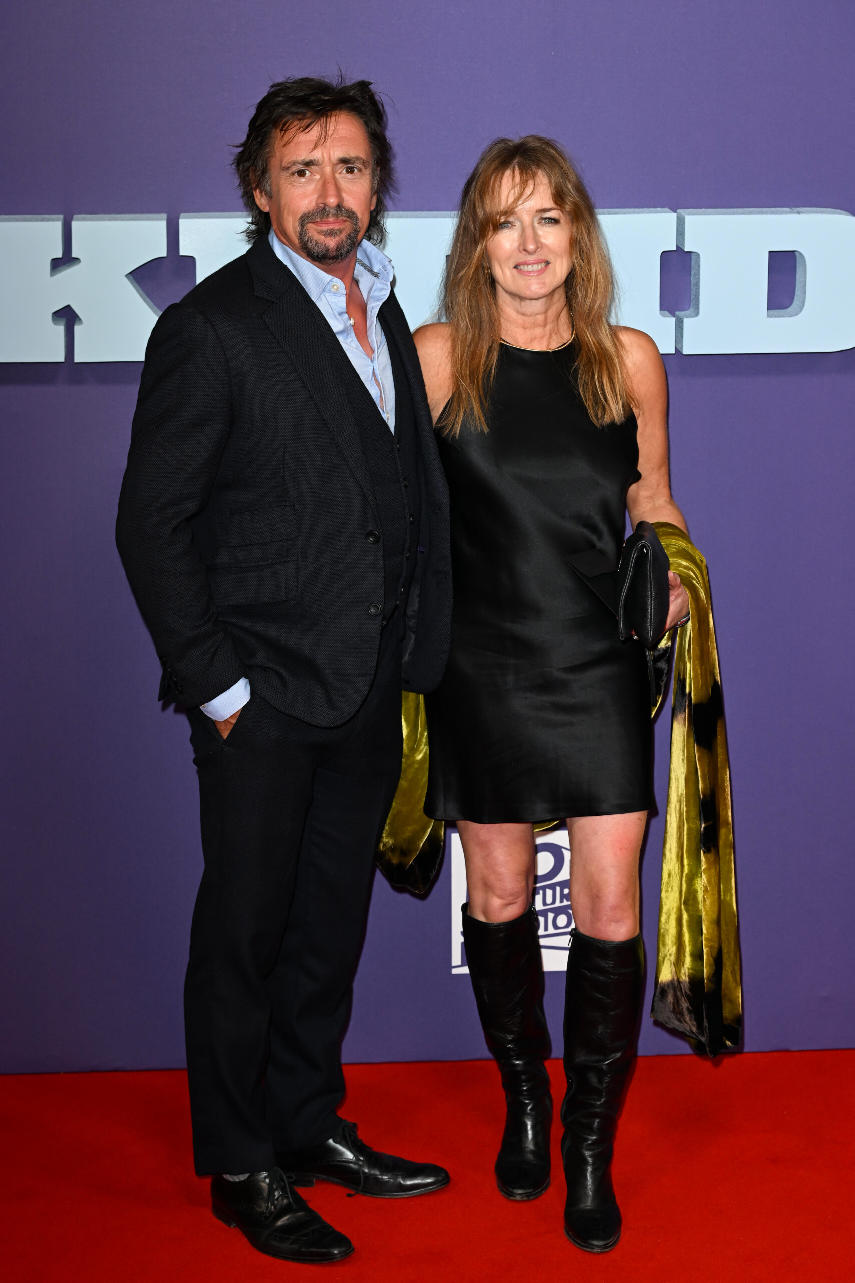 Richard Hammond and wife smiling at an event 