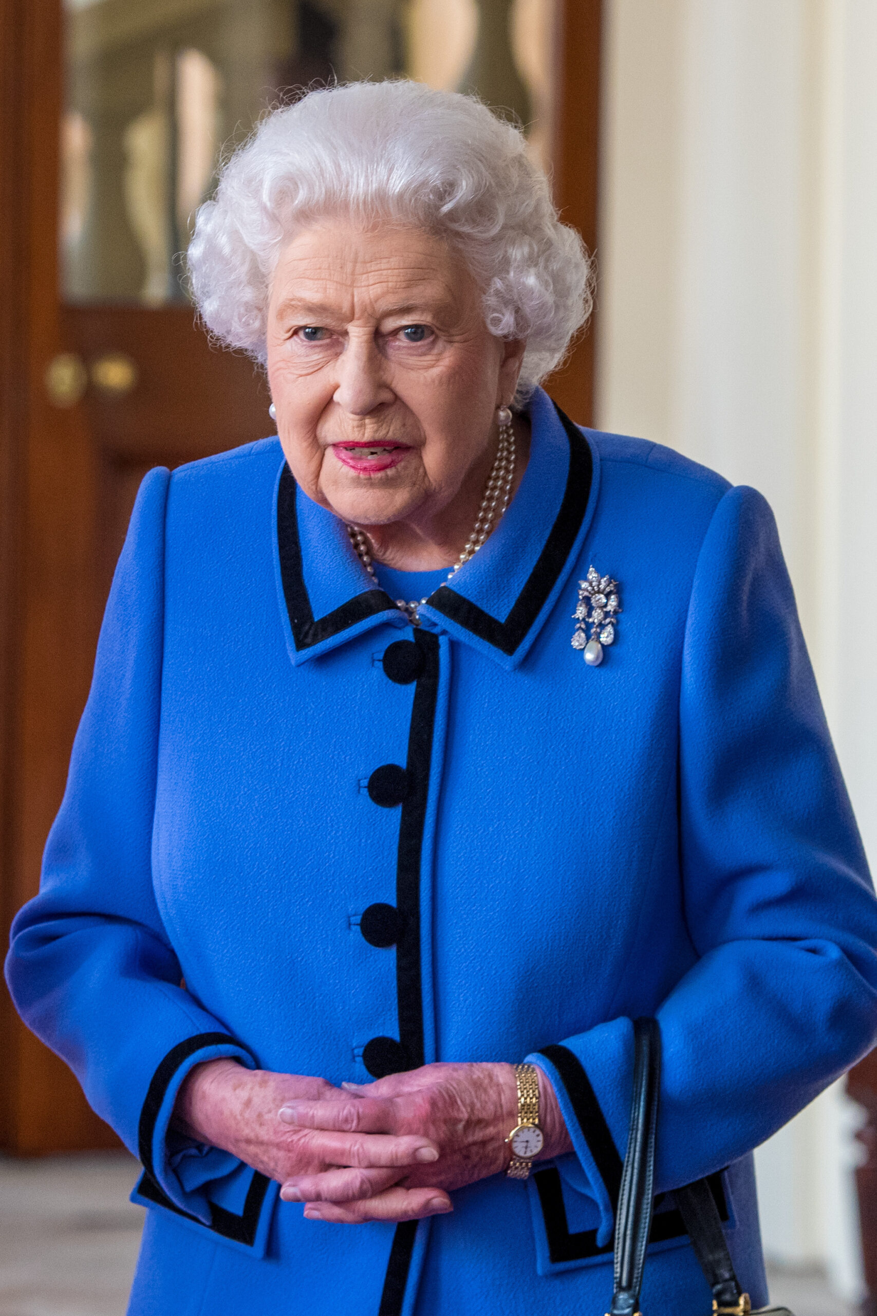 Queen Elizabeth II in blue outfit
