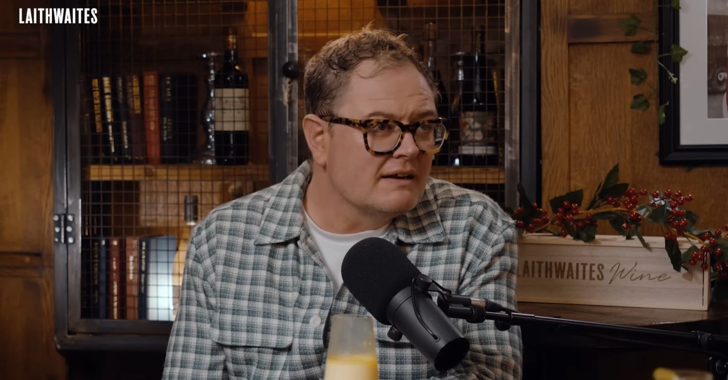 Alan Carr on a podcast