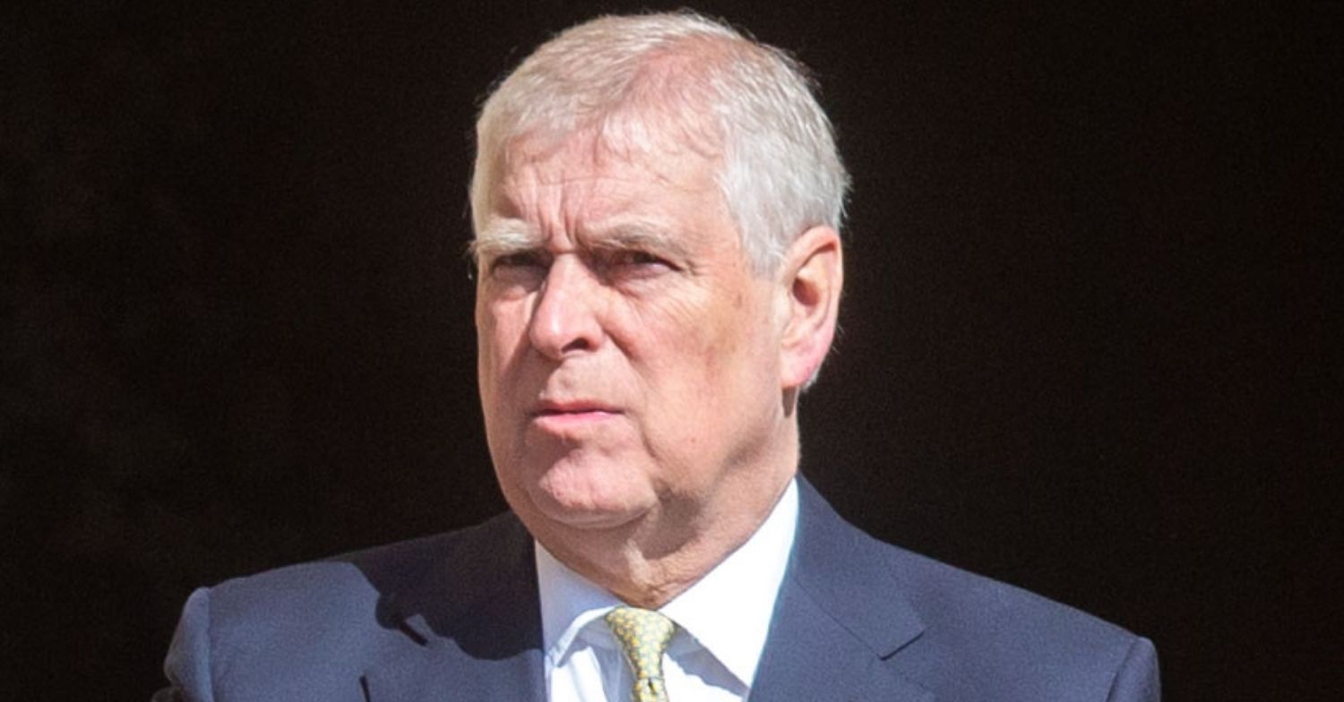 Andrew Mountbatten-Windsor frowning in suit